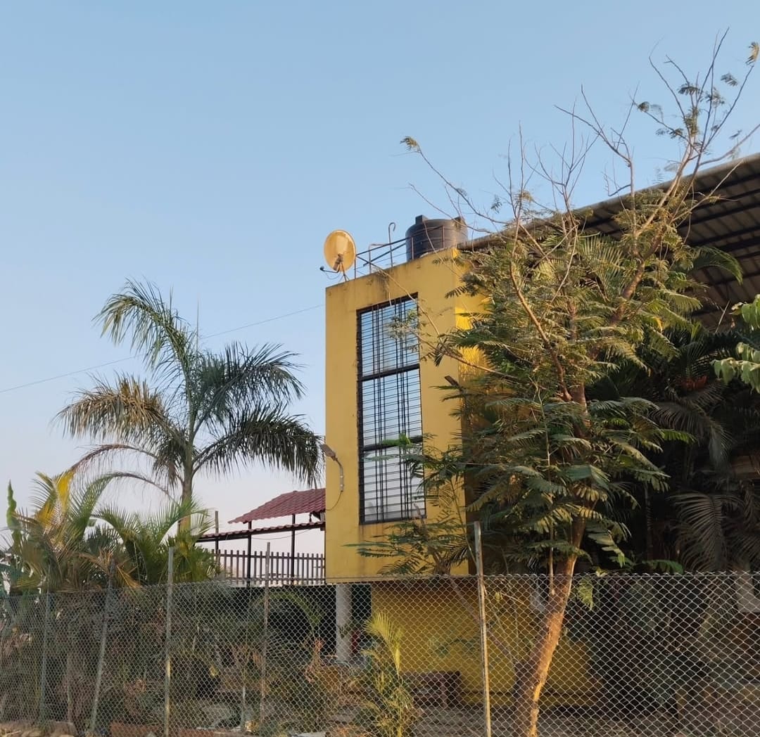 White Smoke Villa at golden hour in the Sahyadri mountains